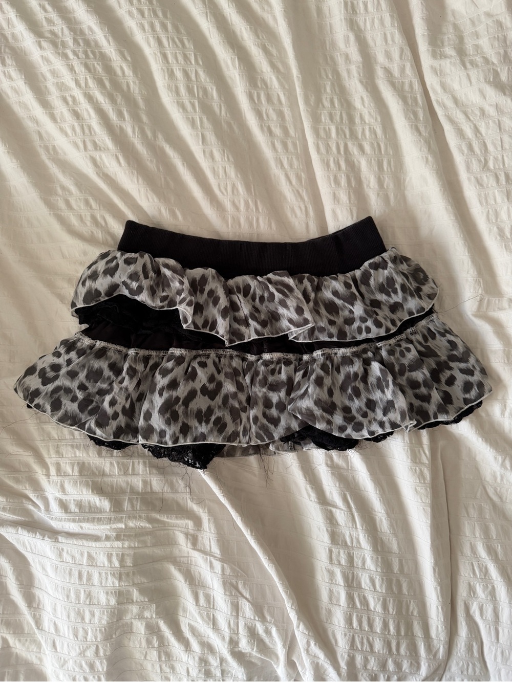 Lowrise mini leopard print grey & black ruffle skirt